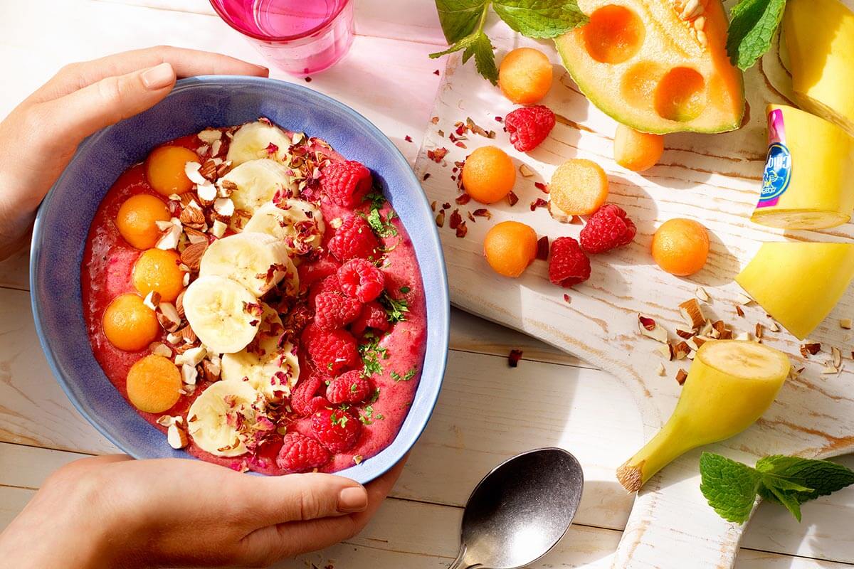 Chiquita banana raspberry smoothie bowl with melon and nuts