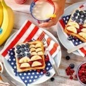 Peanut butter and jelly sandwich with Chiquita banana and blueberry