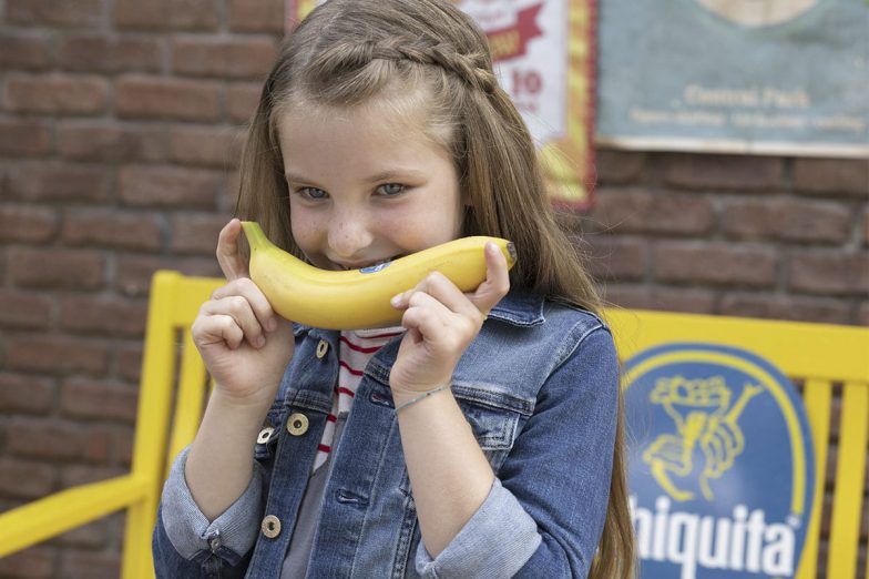 Linda smiling with Chiquita banana